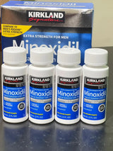 Imagem real de quatro frascos de Minoxidil Kirkland 5% com caixa original ao fundo, mostrando o tratamento para até 4 meses oferecido pela MinoxFarma